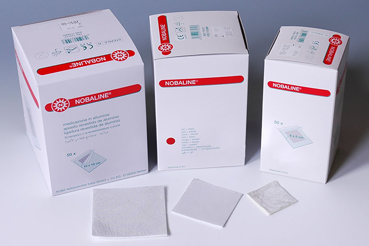 Compress for wounds, aluminum-coated