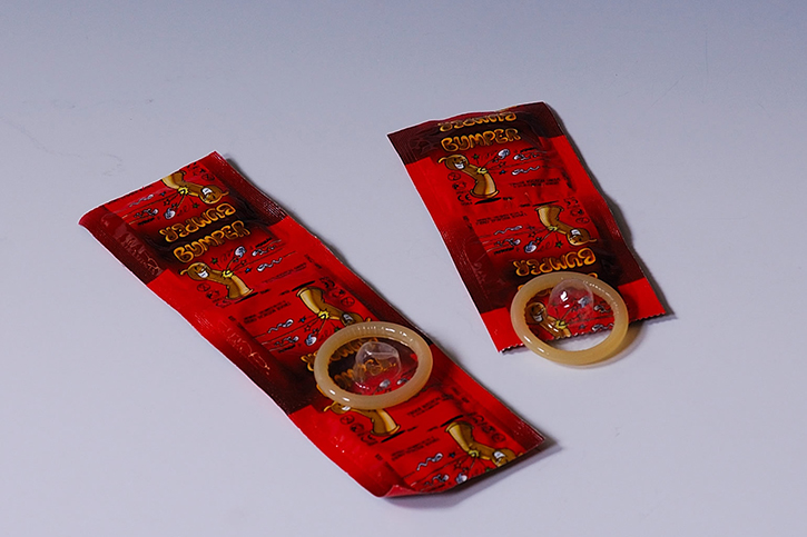 Condoms, individually sealed, lubricated